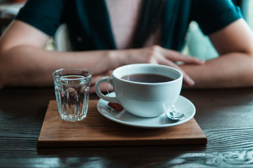 Beautiful young asian woman in the cafe drinking coffee.
