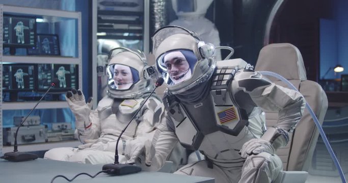 Astronauts talking at pre-flight press conference