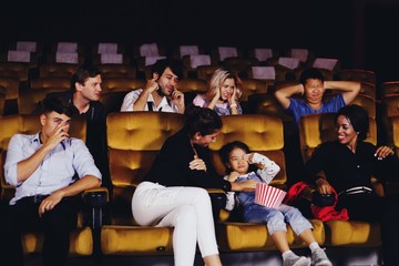group of young people in cinema