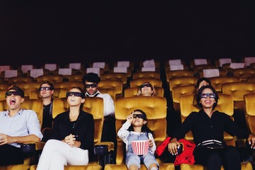 group of young people in cinema