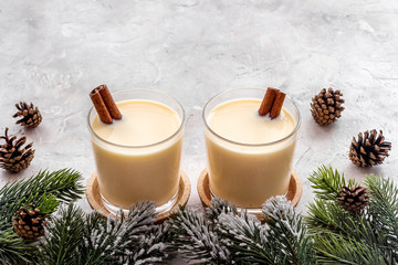 Drink eggnog on grey New Year table copy space