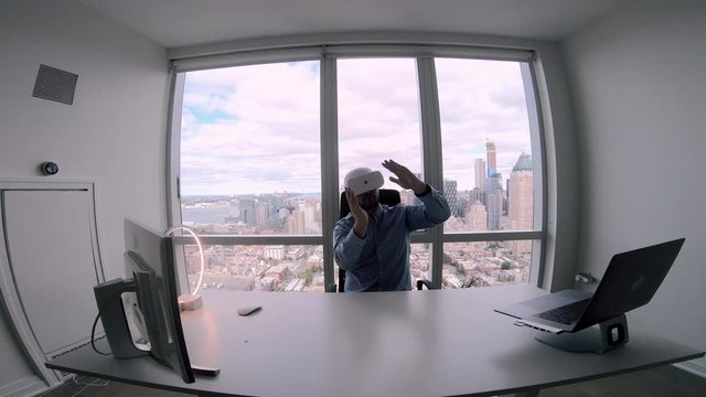 Caucasian employee in VR headset creating BTL communications and direct sales for using in various businesses to demonstrate product at contemporary exhibitions, concept of visual simulation