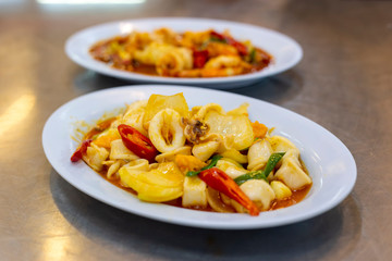 Stir-fried squid with salted egg yolk.