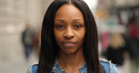 Young black woman in city face portrait