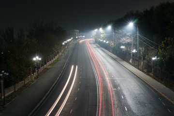 Fototapeta na wymiar Night Shymkent, view from the bridge (Independence Park).