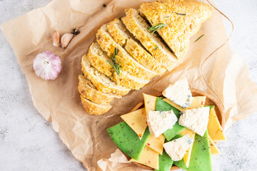 bread sliced cheese is on a plate