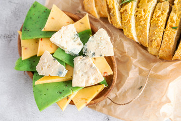 bread sliced cheese is on a plate