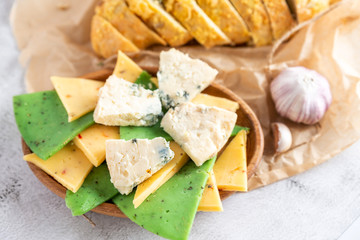 bread sliced cheese is on a plate