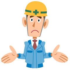 青い作業着の工事現場の男性が呆れる