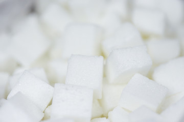 Close up of white sugar , top view / Sugar cubes texture background