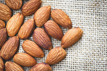 Almonds on sack background top view - Close up almond nuts natural protein food and for snack