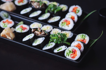 Two vegetarian sushi platter with  maki, futomaki and gunkans.