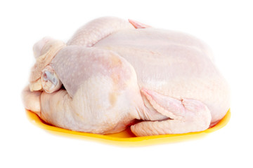 Chicken meat in a plate on a white background