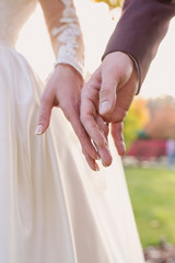 hands of wedding couple  in love. Relationship, love and tenderness concept