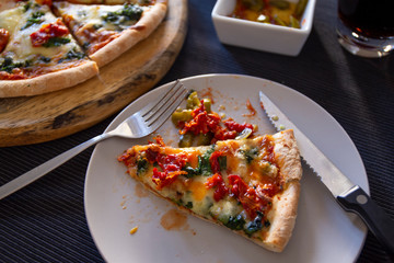 Homemade spinach pizza with mozzarella