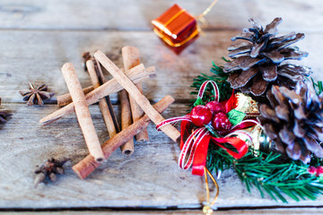 christmas still life with pinecone and decorations