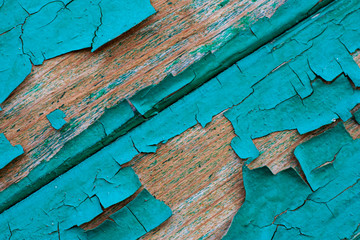Texture of old wooden boards with peeling paint