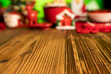 Christmas time. Christmas tableware and decorations. Red and brown colors. Rustic wooden background.