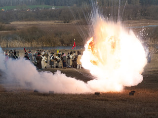 a real thermite explosion in an open area people in the background - obrazy, fototapety, plakaty