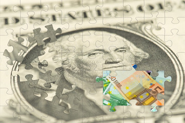 Ein Puzzle aus Dollar und Euro Geldscheinen