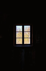 Fototapeta premium Bright window on dark background.
