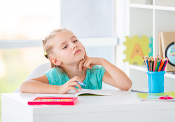 Little girl studying