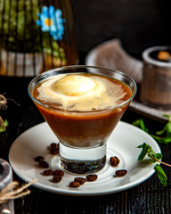 brown colored coffee on the table