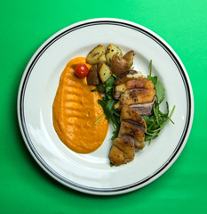 crispy baked meat and potatoes