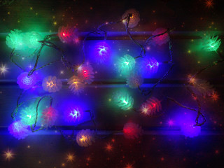 abstract christmas lights garland cones blurs background