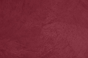 Dark red low contrast concrete textured wall background to your concept or product. Winter color trend. - obrazy, fototapety, plakaty