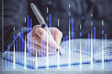 Double exposure of woman's hands making notes with forex graph hologram. Concept technical analysis.