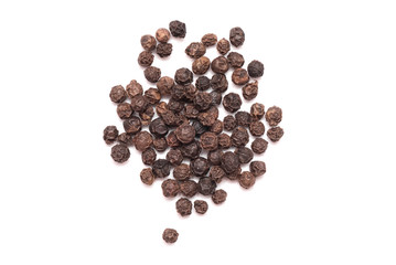 Heap of peppercorns isolated on the white background.