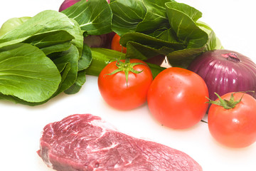 Raw beef with fresh vegetable shed pats