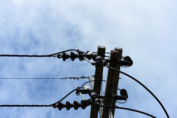 Obraz premium High voltage transmission line under the blue sky