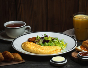 breakfast with fried eggs coffee and orange fresh