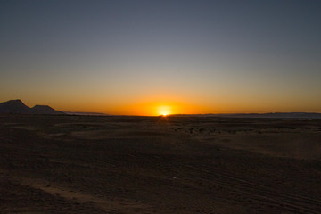 Sunset in the desert of Zahora (Morocco)