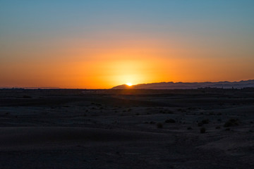 Sunset in the desert of Zahora (Morocco)