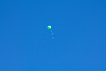 balloon flying into the sky
