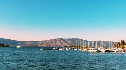Panoramic view from the island of Korcula to the Peljesac peninsula, sailboats and mountains, Croatia
