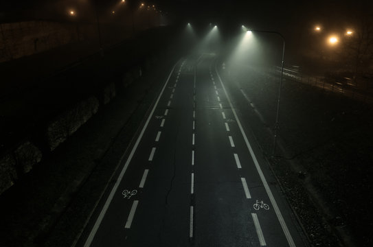 Empty Night Road With Street Lights