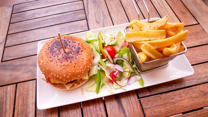 Hamburger and fries on a table