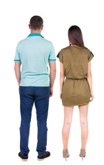 Back view of couple. beautiful friendly girl and guy together.