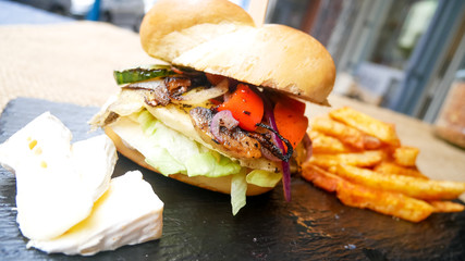 Hamburger and fries on a table