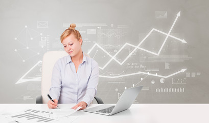 Business person sitting at desk with financial change, and report making concept