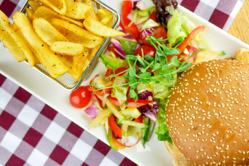 Hamburger and fries on a table
