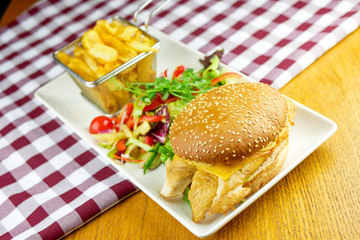 Hamburger and fries on a table