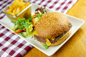 Hamburger and fries on a table
