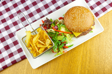 Hamburger and fries on a table