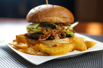 Hamburger and fries on a table