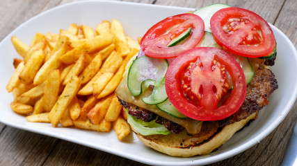 Hamburger and fries on a table